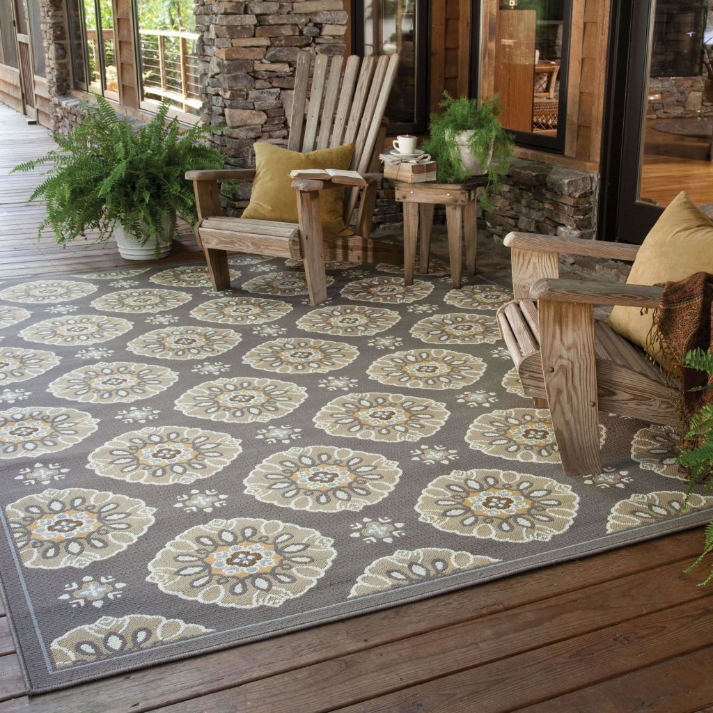 http://poshrug.com/cdn/shop/products/woven-bali-grey-gold-floral-outdoor-rug-2.jpg?v=1561269542