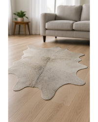 Light Gray Cowhide Hand Knotted Area Rug, 5x7 – Stain Resistant in Low Angle View — cowhide area rug 17