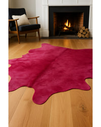 Fuchsia Cowhide Area Rug – Hand Knotted, 6x7 in Low Angle View — cowhide area rug 210