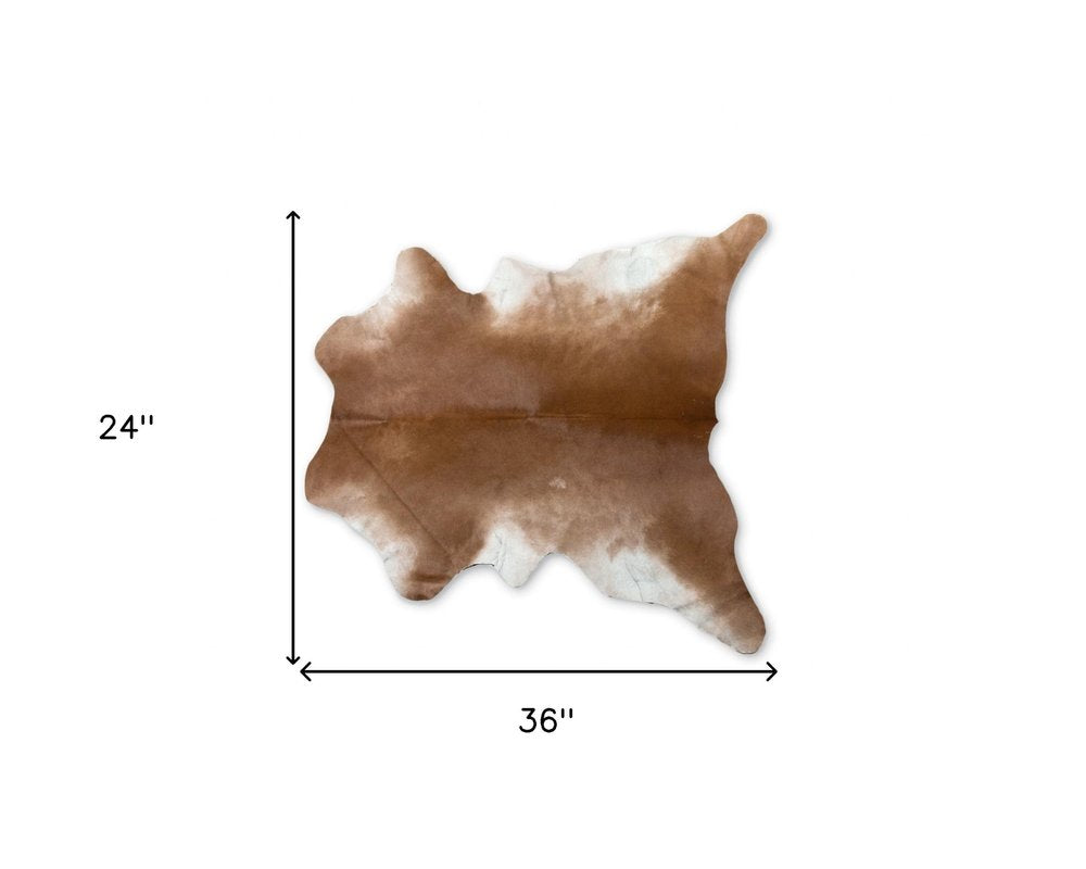 Tan Cowhide Print Area Rug – Soft, Handcrafted Accent