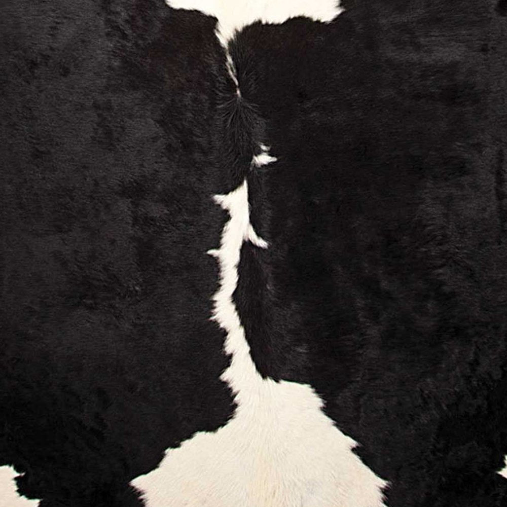 Black Cowhide Animal Print Rug – Modern Statement Decor