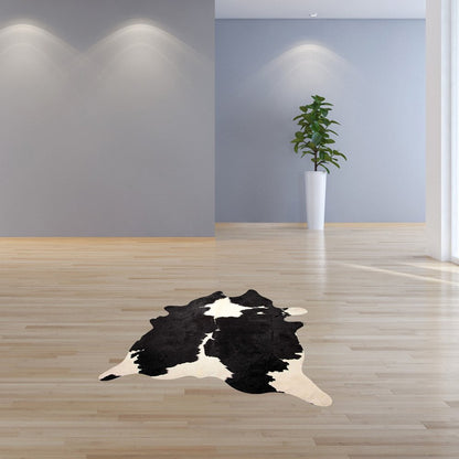 Black Cowhide Animal Print Rug – Modern Statement Decor