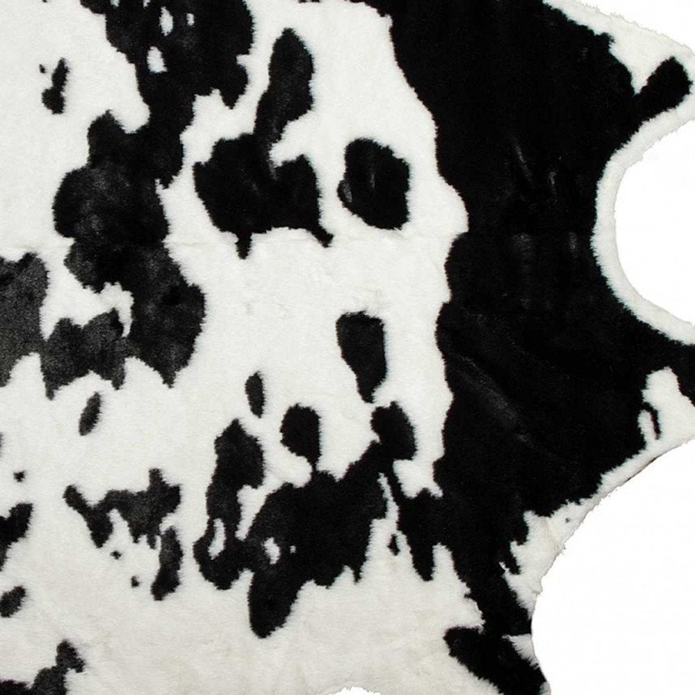 **Cowhide Print Hand Knotted Rug – Brown & White Accent**