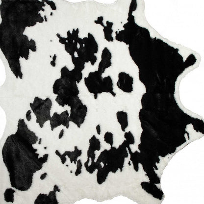 **Cowhide Print Hand Knotted Rug – Brown & White Accent**