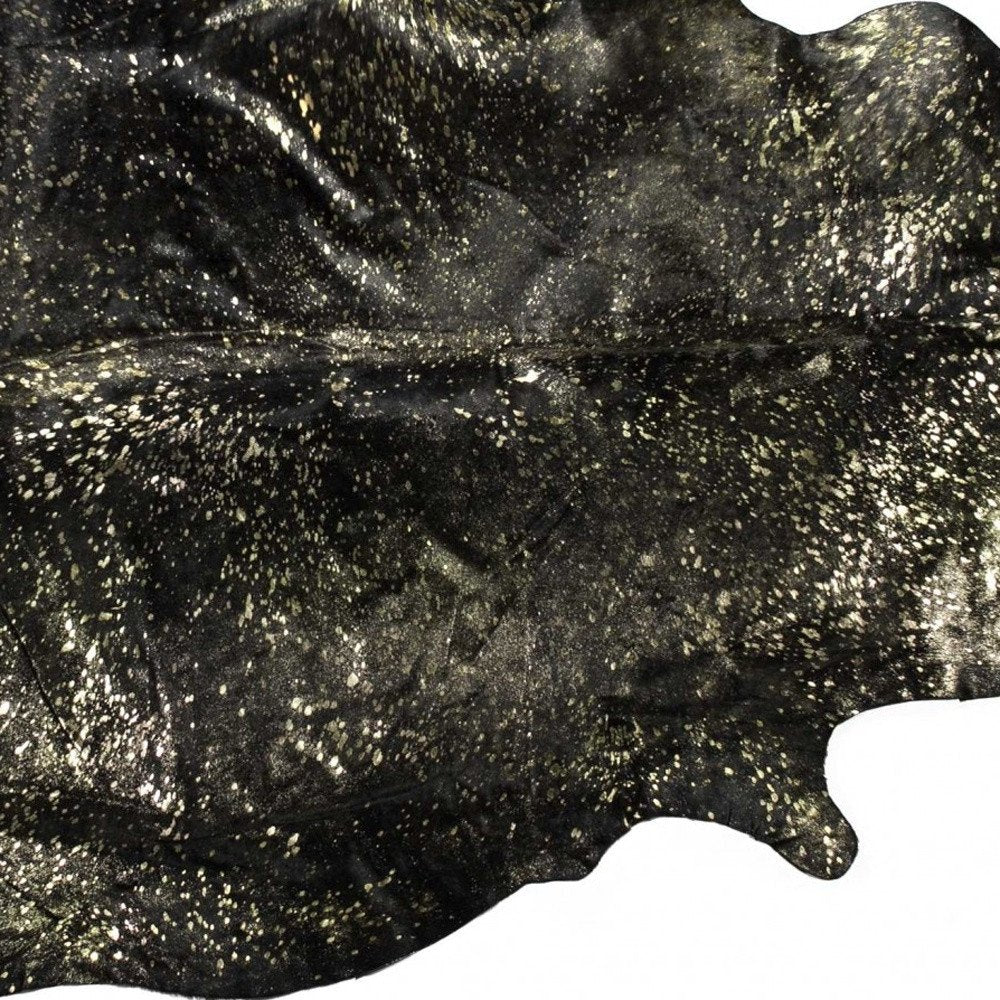 Black Cowhide Print Area Rug – Gold Accents, 5x7