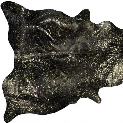 Black Cowhide Print Area Rug – Gold Accents, 5x7