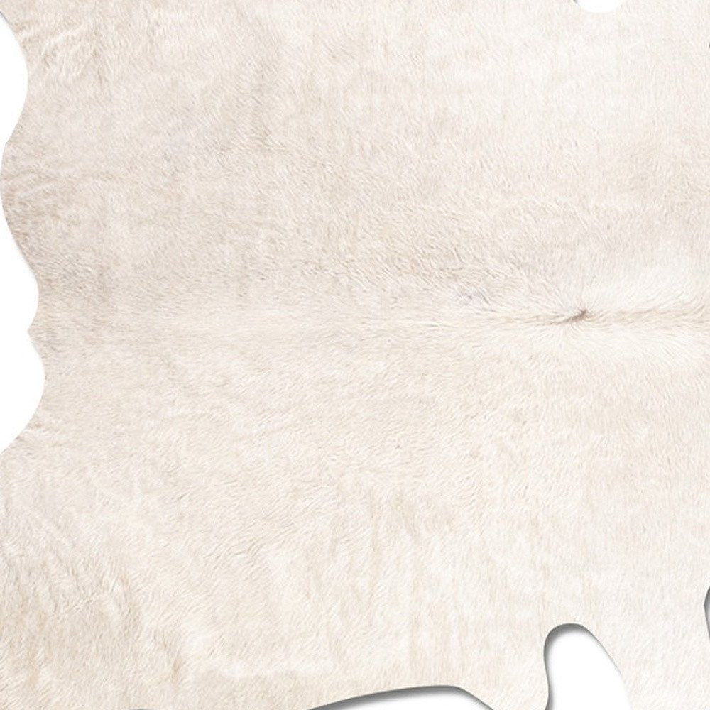 Off White Cowhide Print Rug – Soft, Modern Accent