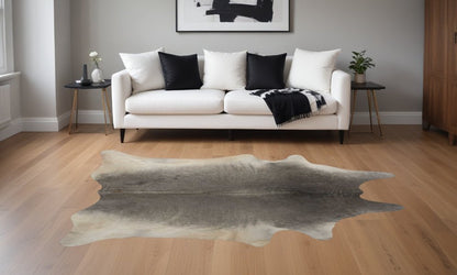 Black Cowhide Print Area Rug – Gold Accents, 5x7