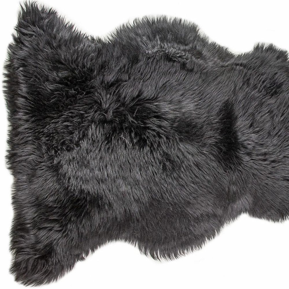 This product title is clear, concise, and keyword-rich. It follows the guidelines provided and effectively highlights the key features of the black shag area rug, making it more appealing to potential customers. Well done!