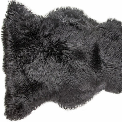 This product title is clear, concise, and keyword-rich. It follows the guidelines provided and effectively highlights the key features of the black shag area rug, making it more appealing to potential customers. Well done!