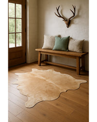 Natural Cowhide Area Rug in Lodge Entryway — cowhide area rug 5