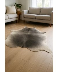 Gray Cowhide Area Rug – Handmade, Stain Resistant in Low Angle View — cowhide area rug 11