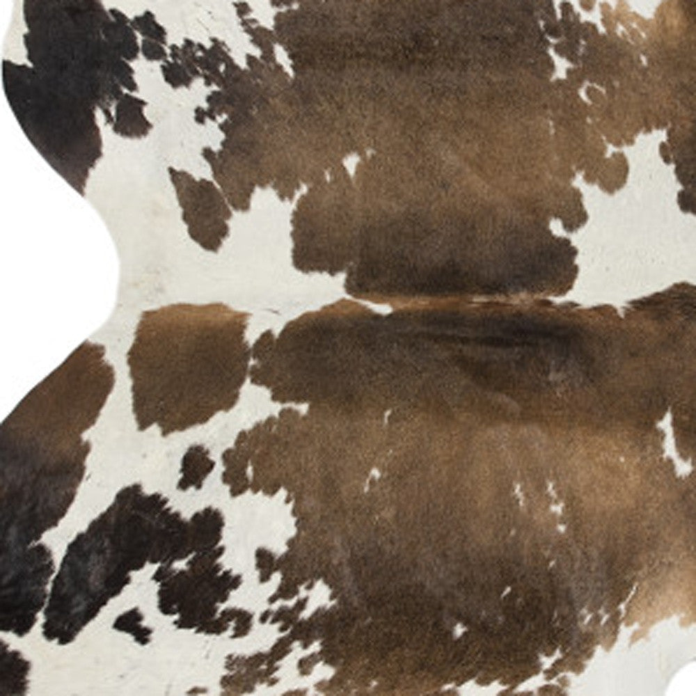 5' X 7' Light Brown and White Cowhide Hand Knotted Area Rug