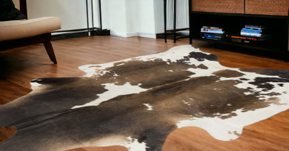 5' X 7' Light Brown and White Cowhide Hand Knotted Area Rug