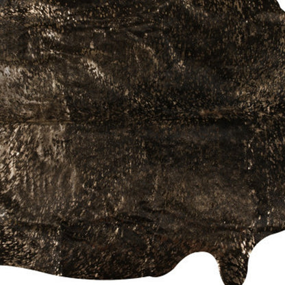 5' X 7' Black and Copper Gold Cowhide Hand Knotted Area Rug