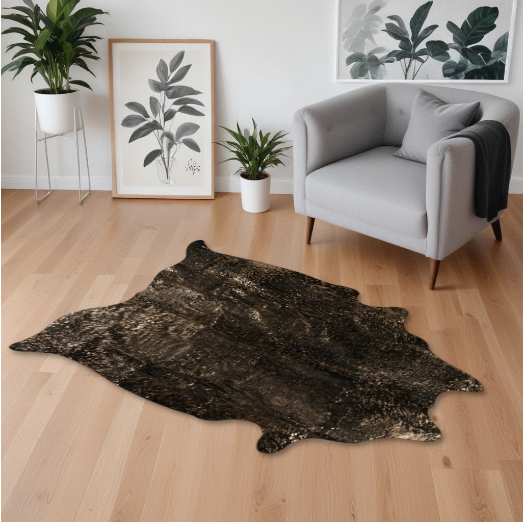 5' X 7' Black and Copper Gold Cowhide Hand Knotted Area Rug