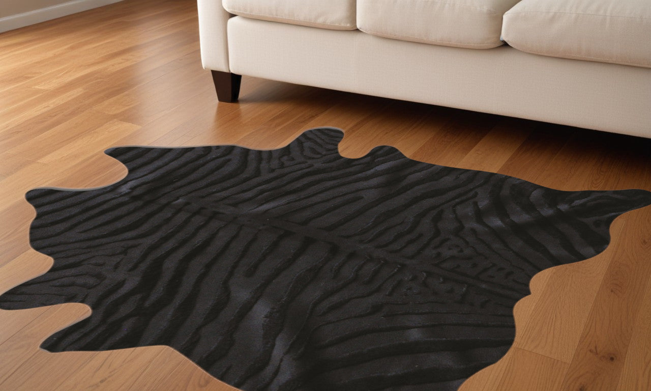 5' X 7' Brown and Black Cowhide Hand Knotted Area Rug