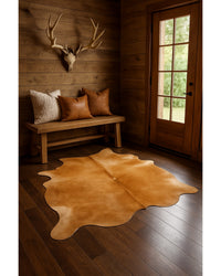 Tan Cowhide Area Rug in Lodge Entryway — cowhide area rug 5