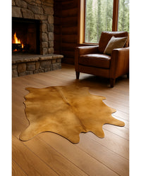 Taupe Cowhide Print Area Rug in Cabin Living Room — cowhide area rug 4