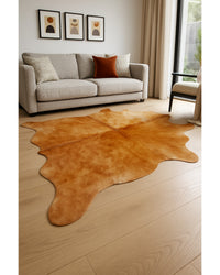 Golden Brown Cowhide Area Rug in Low Angle View — cowhide area rug 8