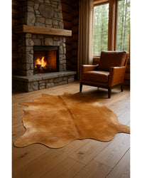 Tan Cowhide Area Rug in Cabin Living Room — cowhide area rug 4