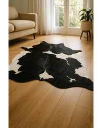 Black Cowhide Animal Print Rug – Modern Statement Decor Low Angle View — cowhide area rug 137