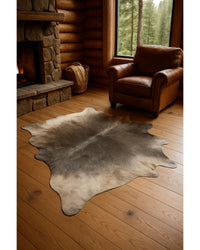 Gray Cowhide Area Rug in Cabin Living Room — cowhide area rug 4