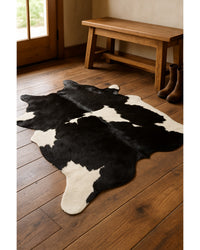 Black Cowhide Animal Print Rug – Modern Statement Decor in Lodge Entryway — cowhide area rug 134