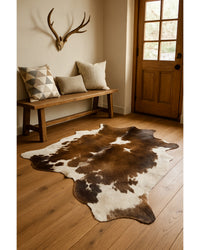 Taupe & White Cowhide Area Rug in Lodge Entryway — cowhide area rug 5