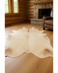 Cowhide Area Rug – Handmade Black & White Accent in Cabin Living Room — cowhide area rug 151