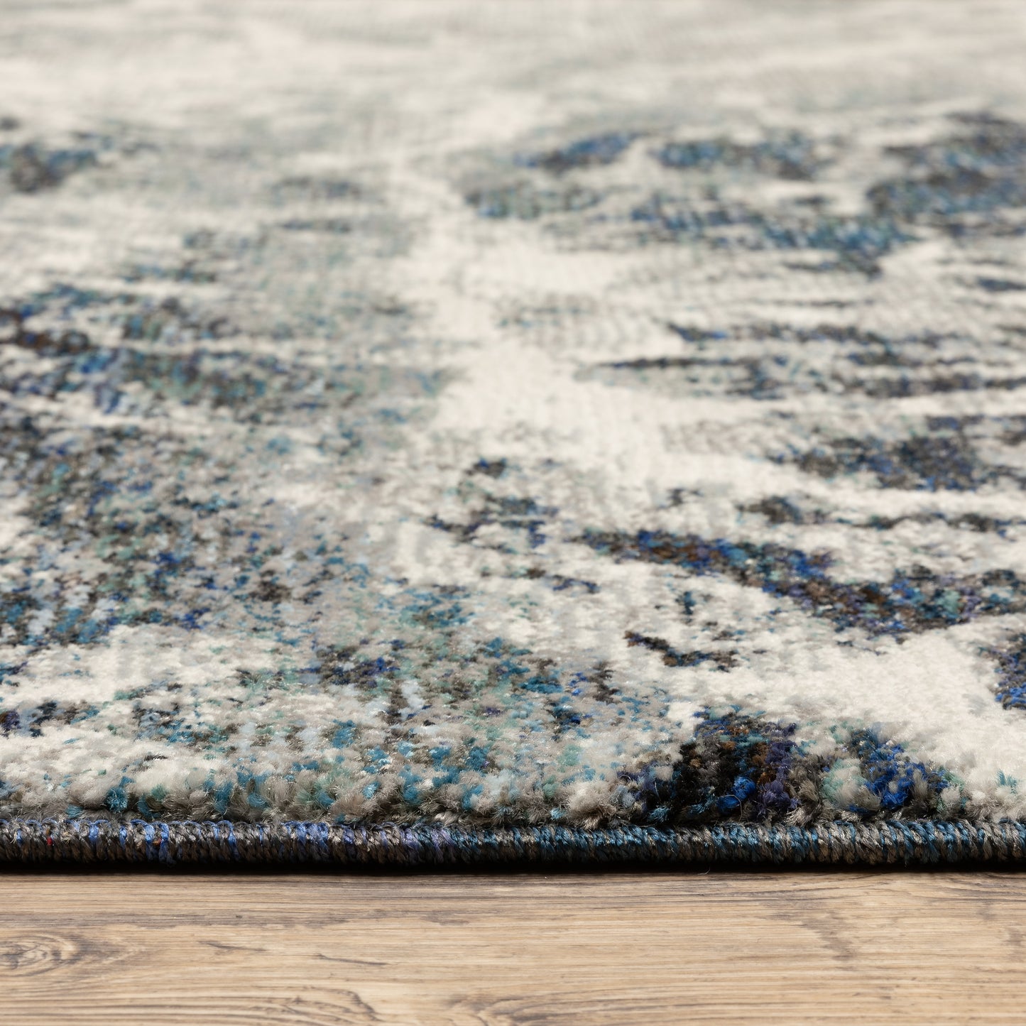 Evolution Blue Ivory Industrial Abstract Indoor Rug