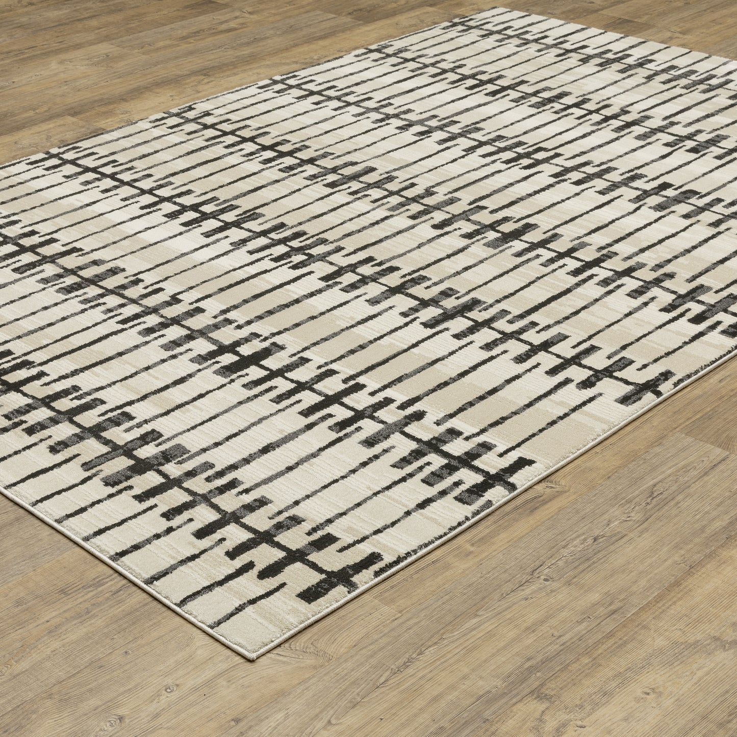 Raylan Ivory Black Modern & Contemporary Geometric Indoor Rug