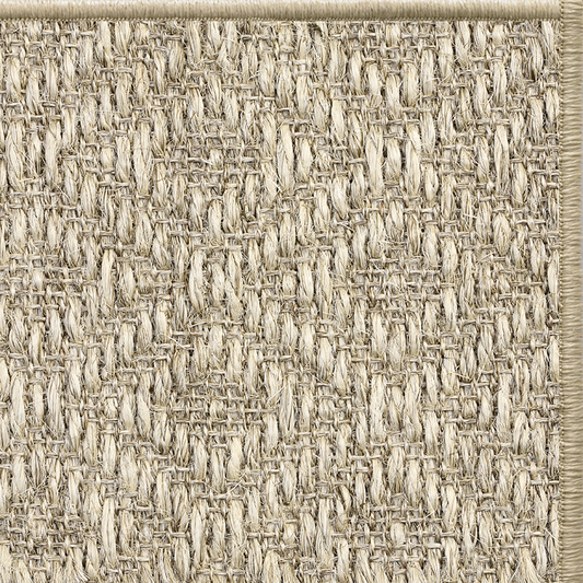 Cardamom Napa diamond-weave sisal rug with a matching serged edge, corner detail