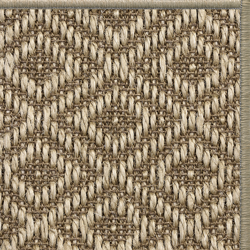 Ginger Napa diamond-weave sisal rug with a matching serged edge, corner detail