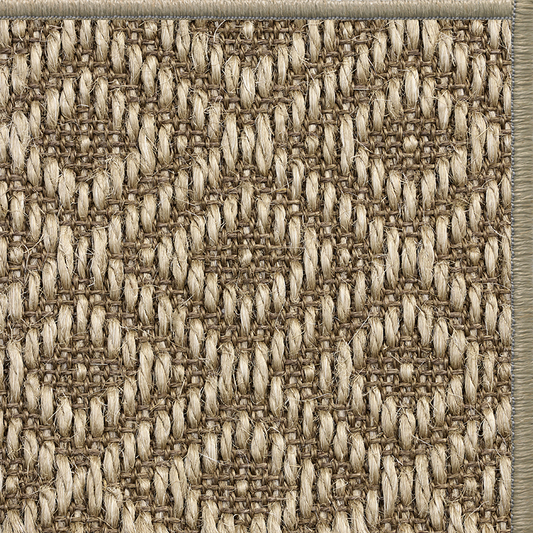 Ginger Napa diamond-weave sisal rug with a matching serged edge, corner detail