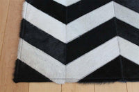 Area Rugs - Madisons Black And White Cowhide Patchwork Rug - Chevron Pattern 4