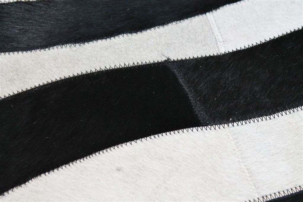 Area Rugs - Madisons Black And White Zebra Striped Patchwork Cowhide Rug