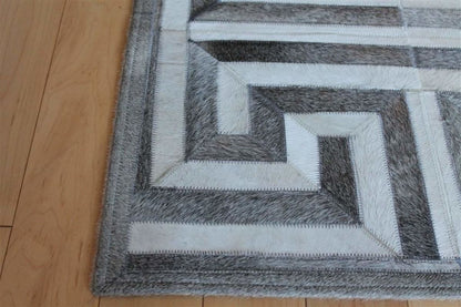 Area Rugs - Madisons Gray And White Cowhide Rug - Patchwork Maze Pattern