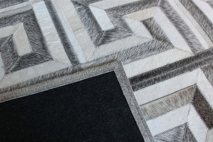 Area Rugs - Madisons Gray And White Cowhide Rug - Patchwork Maze Pattern
